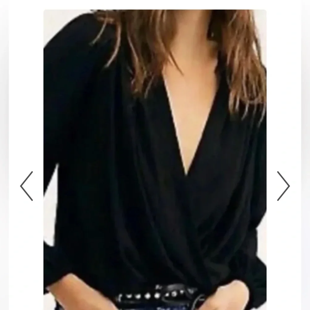 Free people Check it‎ out wrap top. NWOT. Retail 78